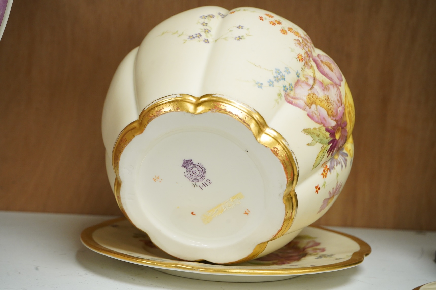 A Worcester floral biscuit barrel on stand, numbered 1412 to the base, 18cm high